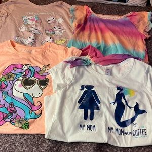 A lot of 4 10/12 shirts.